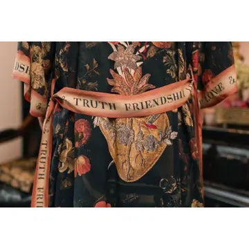 Floral-patterned robe kimono with 'TRUTH FRIENDSHIP' belt